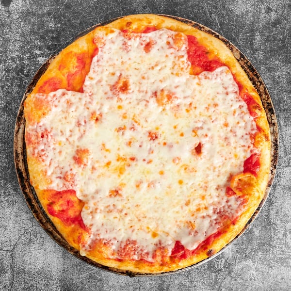 Trent's Pizzeria's classic cheese pizza, with melted mozzarella and red sauce, on a dark background.