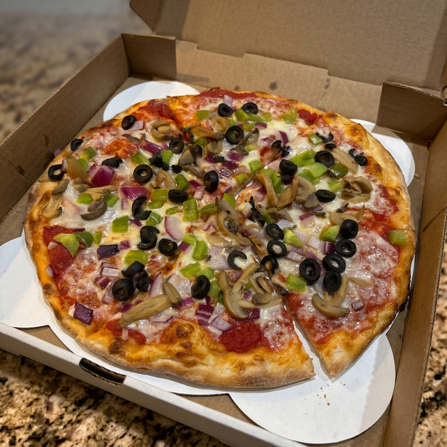 12" Specialty Pizza and a FREE 12"1 Topping Pizza.